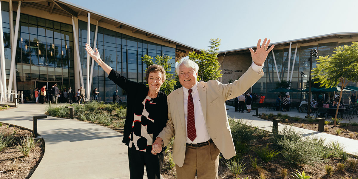 Paul and Cathy Schroeder waving